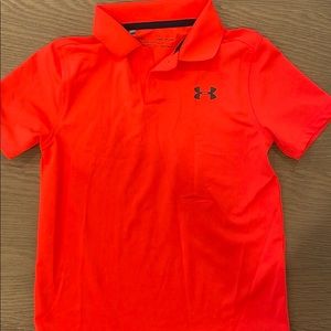 Bright orange/coral boys UA golf shirt/polo